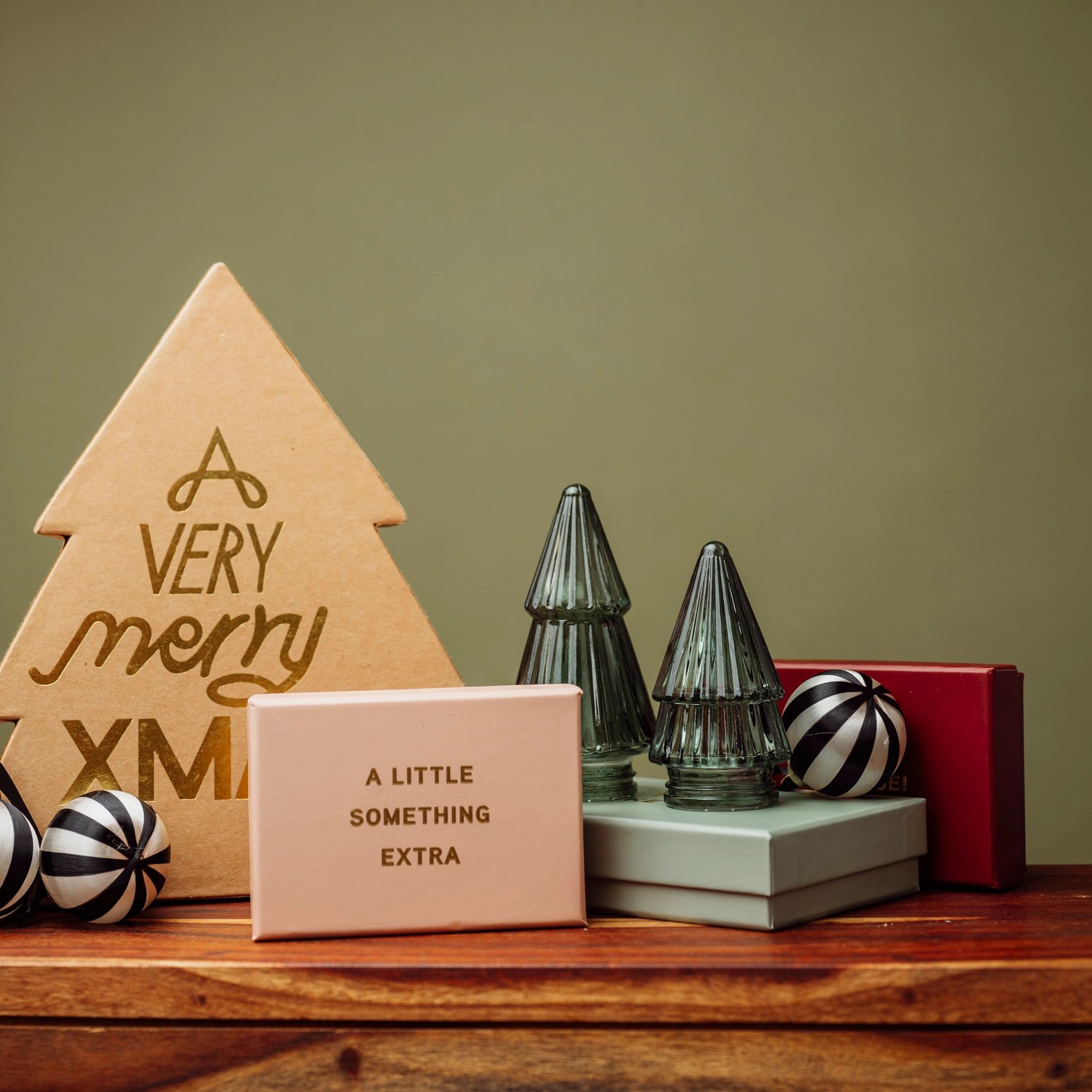 Decorative gift boxes and ornaments styled for boutique shopping